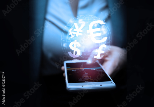 Business, finance and investment, forex trading, currency exchange, economic growth, stock market analysis concept. Using mobile phone checking stock market graph report via mobile apps