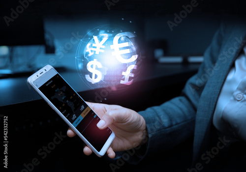 Business, finance and investment, forex trading, currency exchange, economic growth, stock market analysis concept. Using mobile phone checking stock market graph report via mobile apps