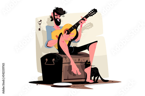 Gypsy man playing on guitar, street artist
