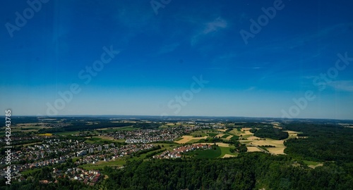 Aerial view of cityscape Todtnau surrounded by buildings and dense trees photo