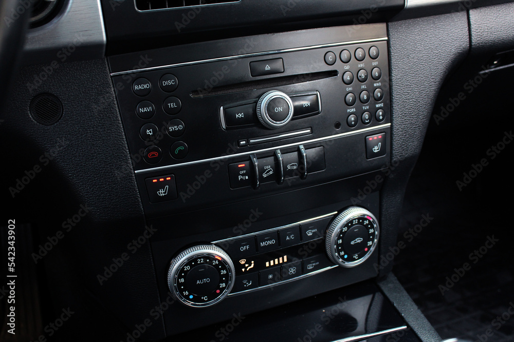 Car dashboard, Multimedia, Air conditioner with power regulator. Car climate control. Automotive climate control. Modern Car air conditioner, interior of a new modern car.