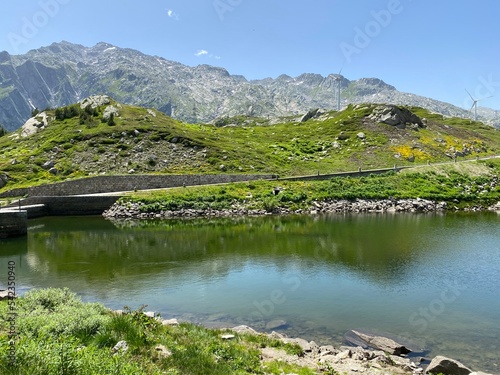Summer atmosphere on the Lago dei Morti or Lake of the Dead (Totensee) in the Swiss alpine area of mountain St. Gotthard Pass (Gotthardpass), Airolo - Canton of Ticino (Tessin), Switzerland (Schweiz)