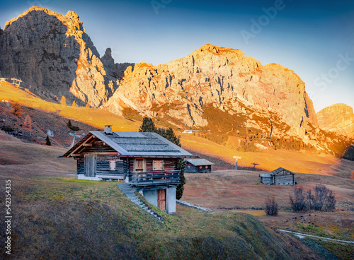 Gorgeous autumn view of  DolomiteAlps. Colorful morning scene of Gardena Pass, Italy, Europe. Traveling concept background.. photo