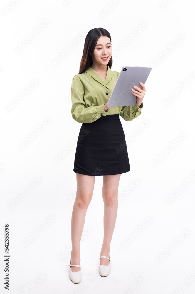 Business woman with a green suit and a black skirt and a folder on a white background Business woman with a green suit and a black skirt and a folder on a white background