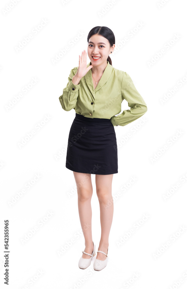 A business woman in a green suit and a black skirt against a white background
