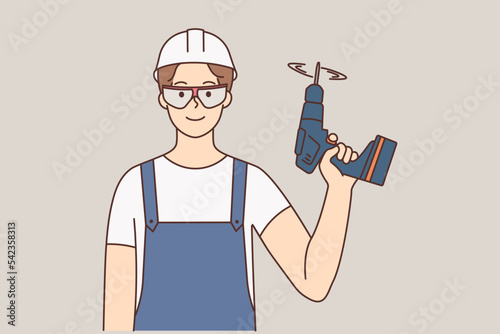 Repairman with drill in hands 
