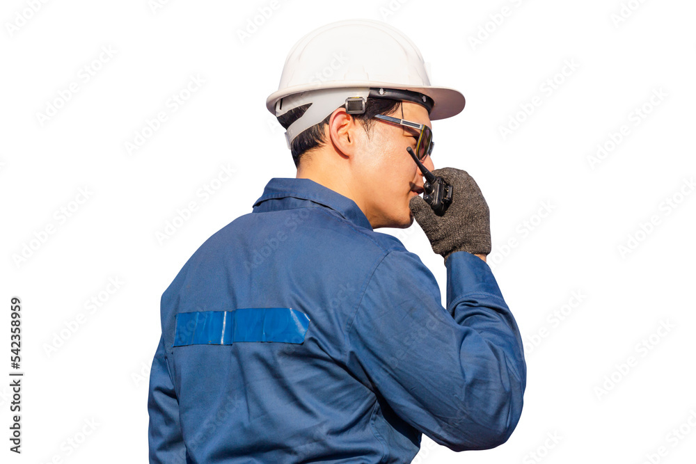 Foreman in hardhat and safety vest talks on two-way radio control loading containers box from cargo Foreman in hardhat and safety vest talks on two-way radio control loading containers box from cargo