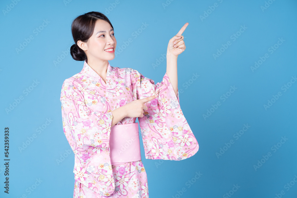 Image of young Japanese woman wearing kimono Image of young Japanese woman wearing kimono