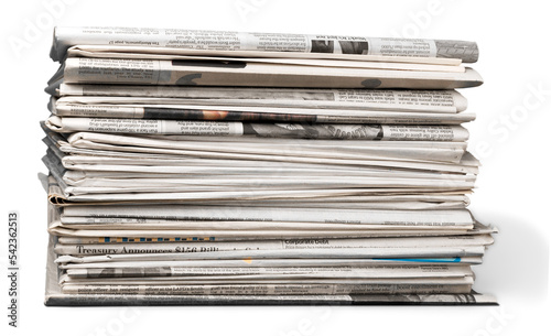 Pile of printed newspapers on white background