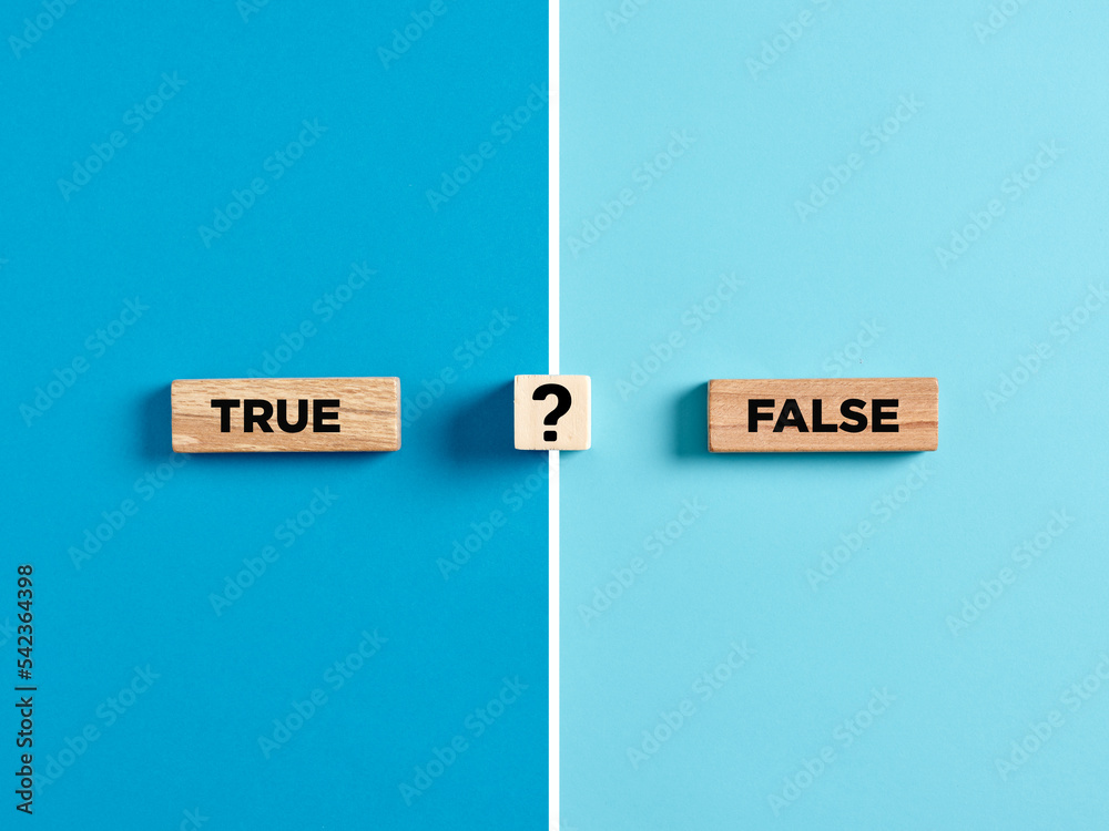 The words true and false on wooden blocks with question mark symbol. - obrazy, fototapety, plakaty 