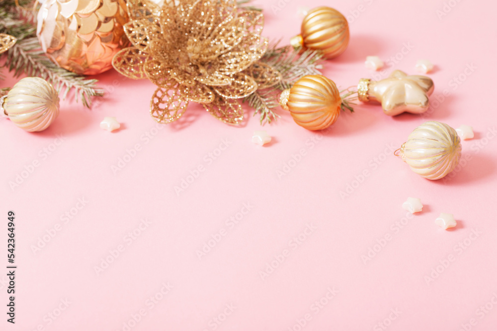 golden christmas decorations on pink background golden christmas decorations on pink background