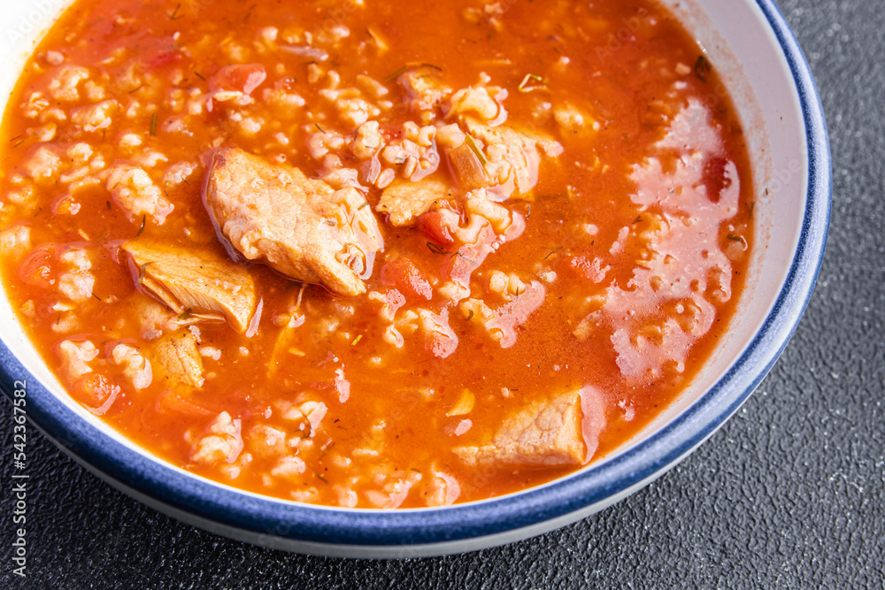 kharcho red tomato soup meat, rice meal food snack on the table copy space food background kharcho red tomato soup meat, rice meal food snack on the table copy space food background