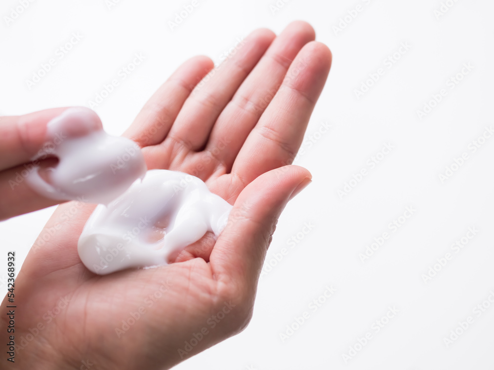 Lotion on Hand with white Background,Woman Applying Cream Moisturizer,Treatment Serum on Palm Up for Apply Face and Body After Shower,Sunsreen for Young and Protection UV,Skin Care Beauty Spa concetp.