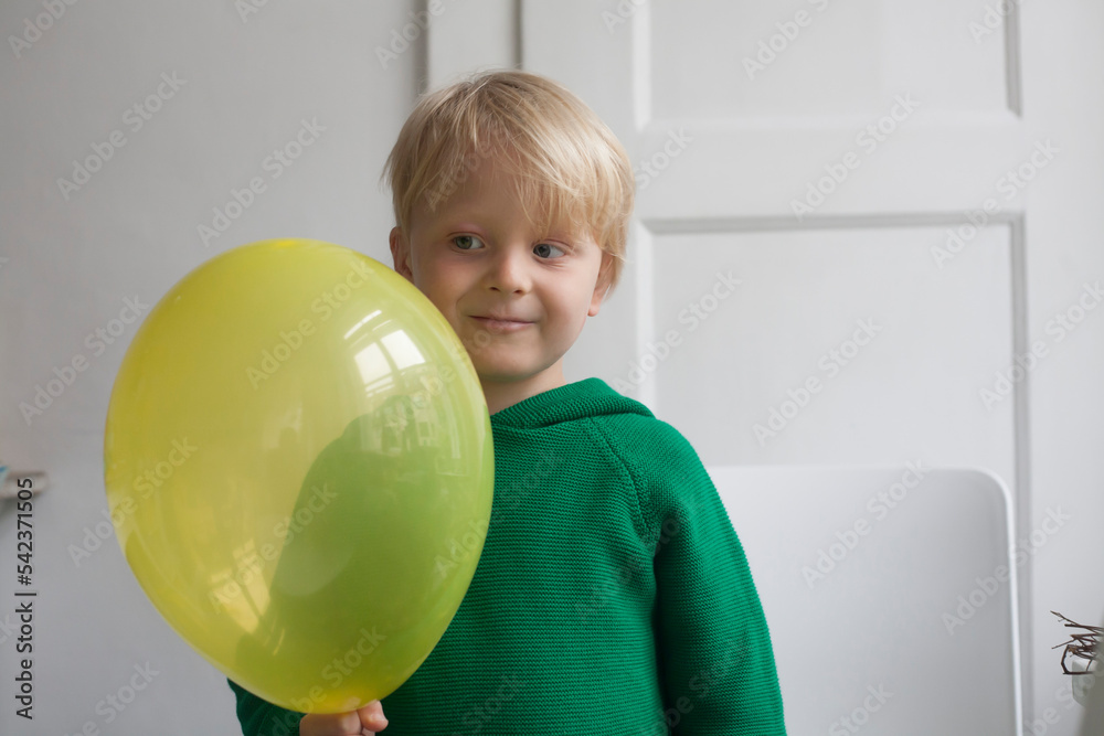 Portrait of smiling little boy with balloon Portrait of smiling little boy with balloon