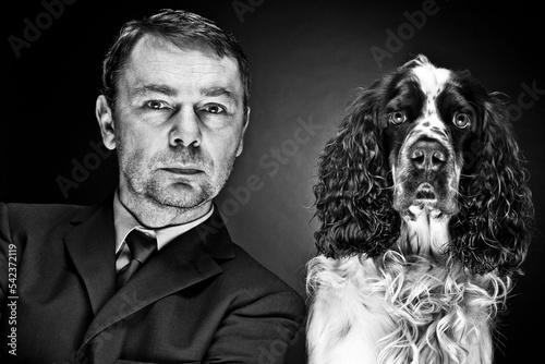 Portrait of mature man with English Springer Spaniel