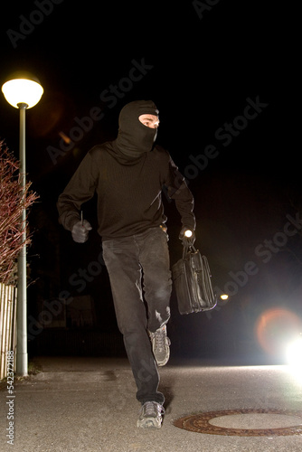 Burglar on the run photo