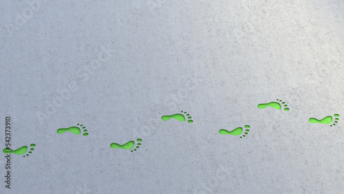 Illustration of green footprints stretching across gray background photo