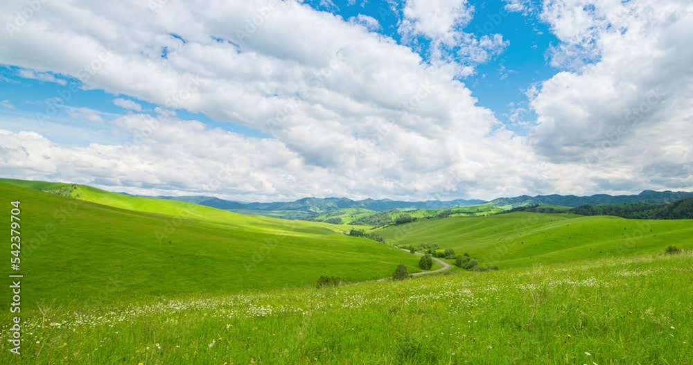 Mountain meadow time-lapse at the summer or autumn time. Wild nature and rural field. Fast clouds movement, green grass and sun rays. Motorised panorama Mountain meadow time-lapse at the summer or autumn time. Wild nature and rural field. Fast clouds movement, green grass and sun rays. Motorised panorama