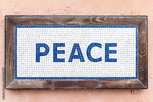 Closeup shot of the word Peace on the wall on Ledra Street, Nicosia, Cyprus photo