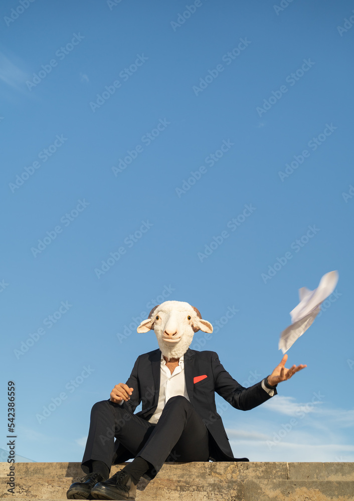 stressed businessman sitting in the stairs throws documents in the air stressed businessman sitting in the stairs throws documents in the air