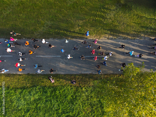 Top view of people running marathon