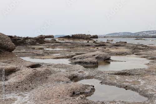Fototapeta Naklejka Na Ścianę i Meble -  Rocky coast with water ponds in Antalya Turkey