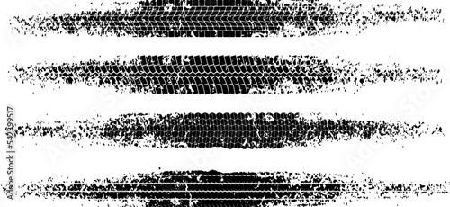 Set of black tire tread print with grunge effect isolated on white background. Footprint of bike or car wheels with seamless texture. Top view of rubber protector marks. Vector brush