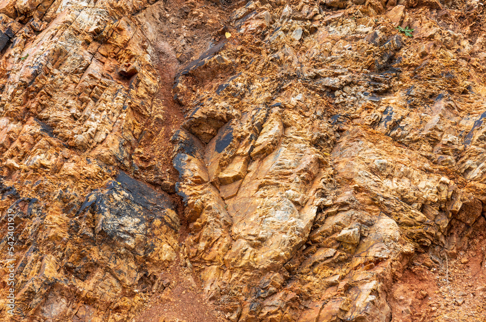 Photo texture of red stones with lichens and moss - photo background Photo texture of red stones with lichens and moss - photo background