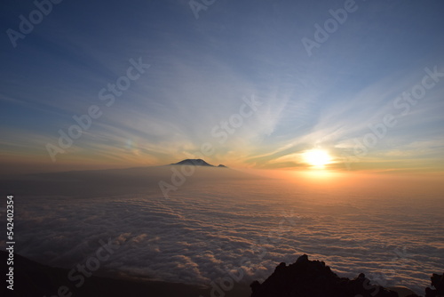 An awesome view of Kilimanjaro at sunrise. This photo was taken at 6.15 am on 3 October 2022 from the summit of Mount Meru, 4562 m, Tanzania's second highest mountain photo