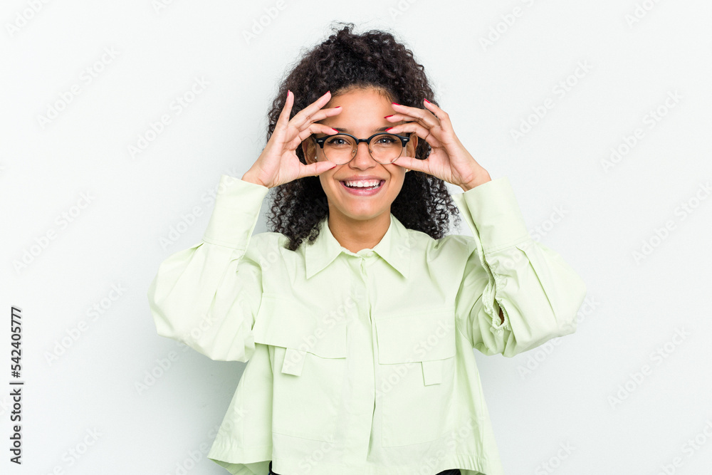 Young african american woman isolated showing okay sign over eyes Young african american woman isolated showing okay sign over eyes