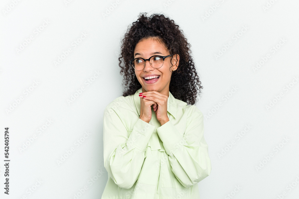 Young african american woman isolated praying for luck, amazed and opening mouth looking to front. Young african american woman isolated praying for luck, amazed and opening mouth looking to front.