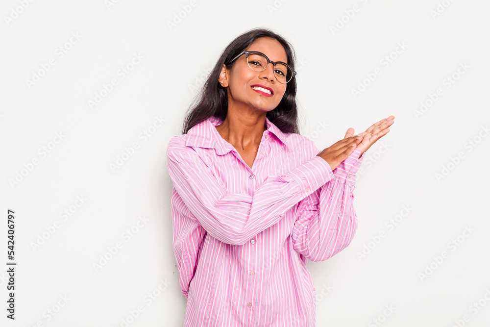 Young Indian woman isolated on white background feeling energetic and comfortable, rubbing hands confident. Young Indian woman isolated on white background feeling energetic and comfortable, rubbing hands confident.