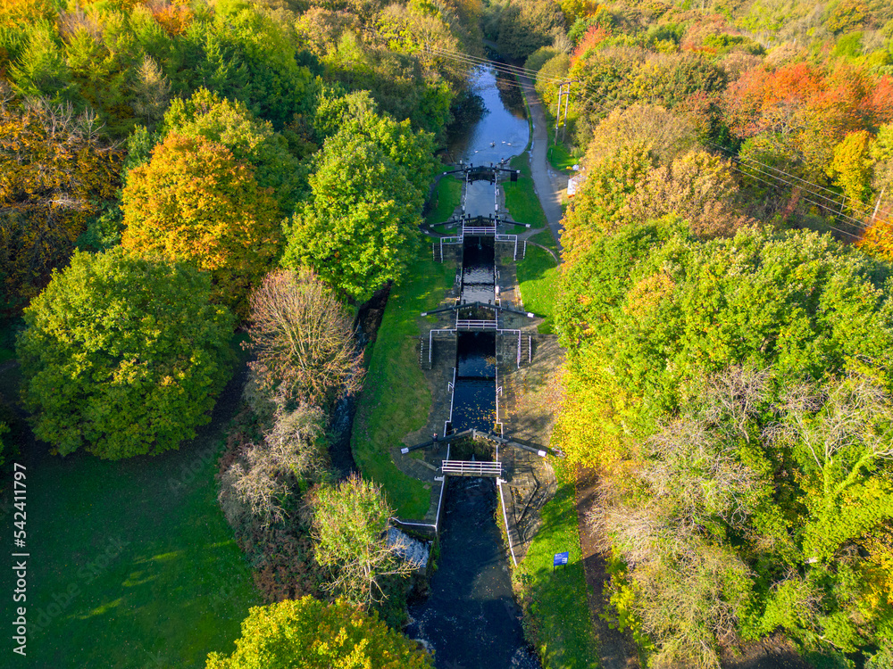 Aerial view of Newlay Locks on the Leeds and Liverpool Canal on an autumn day