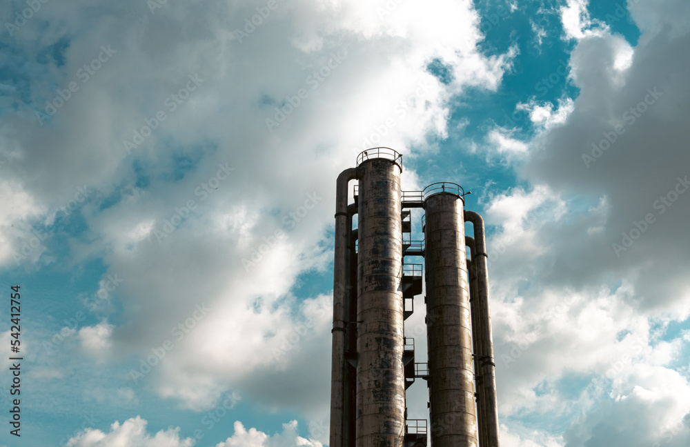 Low angle view of old rusty industrial chimney architecture Low angle view of old rusty industrial chimney architecture