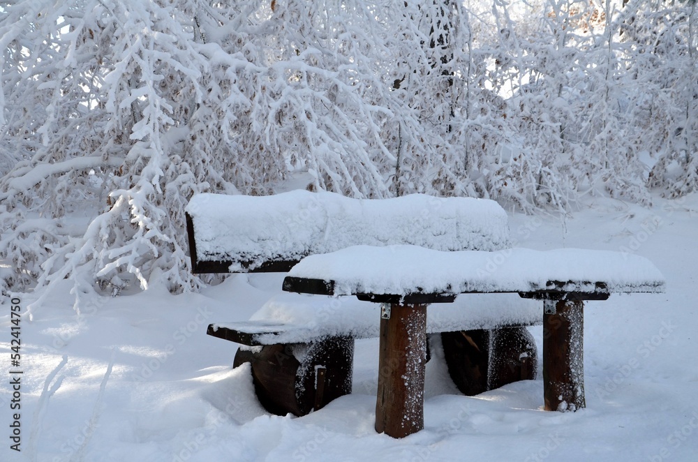 winter landscape with snow covered bench and table at Ruhla Thüringer Wald winter landscape with snow covered bench and table at Ruhla Thüringer Wald
