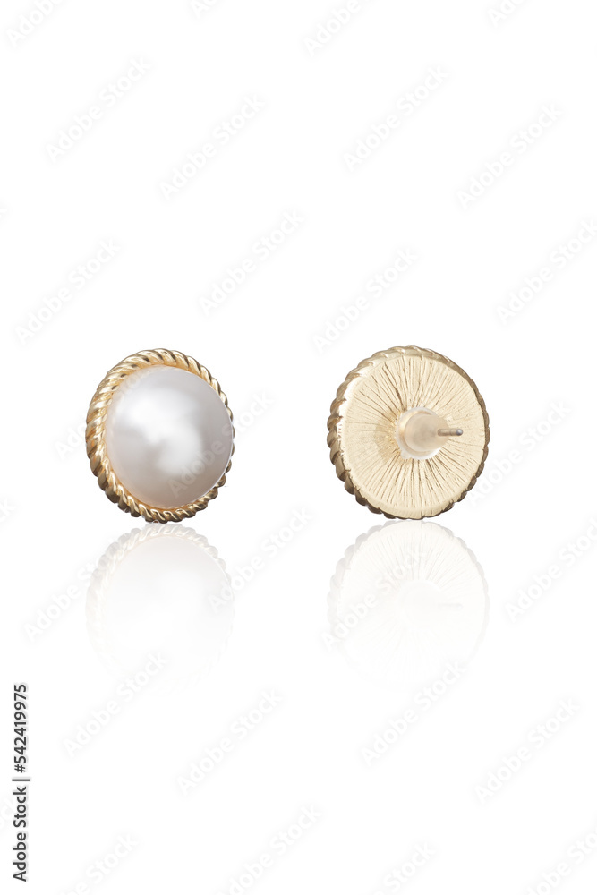 Subject shot of golden round stud earrings adorned with shiny decorative pearls. The earrings are isolated on the white background. Front and back views. Vogue accessory for ladies and girls. Subject shot of golden round stud earrings adorned with shiny decorative pearls. The earrings are isolated on the white background. Front and back views. Vogue accessory for ladies and girls.