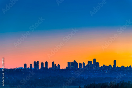 Metrotown district on late sunset sky background © Imagenet