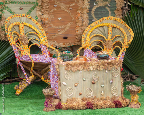 traditional thrones of the bride and the groom in african wedding ceremony. photo