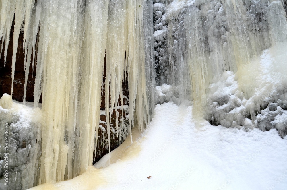 fascinating curtain of icicles looks like a frozen waterfall in gorge Drachenschlucht Eisenach