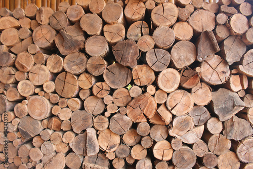 woods cut to be used as firewood texture in shades of brown