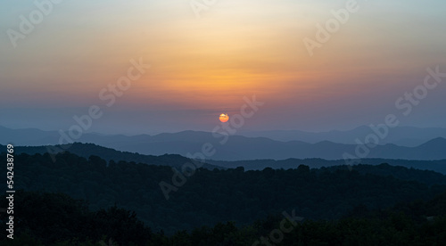 sunset over the mountains with beautiful perspective. © Artyom