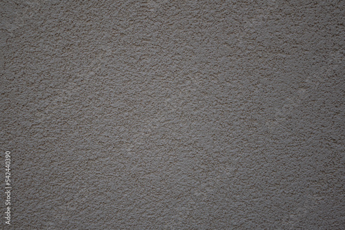 The texture of decorative plaster for the facades of the house.