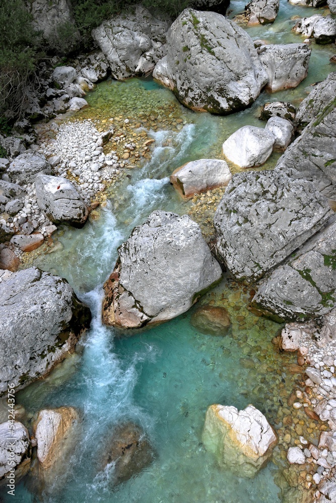 Vertical drone shot of the pure water of Soca river in Slovenia Vertical drone shot of the pure water of Soca river in Slovenia