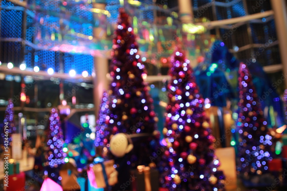 purple neon Christmas tree with decoration gift box  