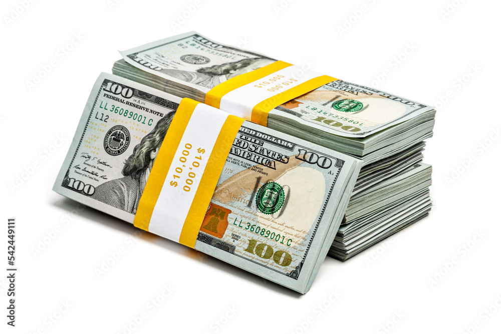 Creative business finance making money concept - stack of bundles of 100 US dollars 2013 edition banknotes bills isolated on white