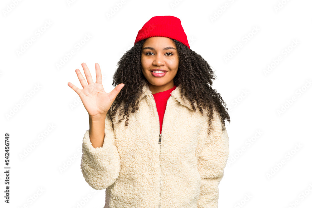 Young african american woman wearing winter clothes isolated smiling cheerful showing number five with fingers.