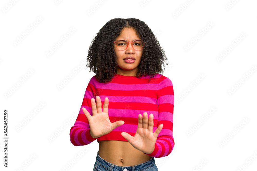 Young african american woman isolated rejecting someone showing a gesture of disgust. Young african american woman isolated rejecting someone showing a gesture of disgust.
