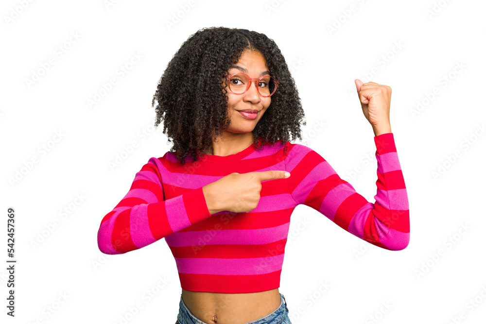 Young african american woman isolated showing strength gesture with arms, symbol of feminine power