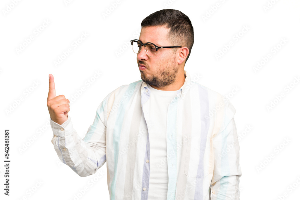 Young caucasian man isolated pointing with finger at you as if inviting come closer. Young caucasian man isolated pointing with finger at you as if inviting come closer.
