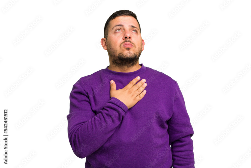 Young caucasian man isolated taking an oath, putting hand on chest. Young caucasian man isolated taking an oath, putting hand on chest.